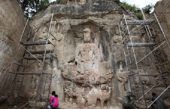 Carving of a Tibetan bodhisattva. From archaeologynewsnetwork.blogspot.com