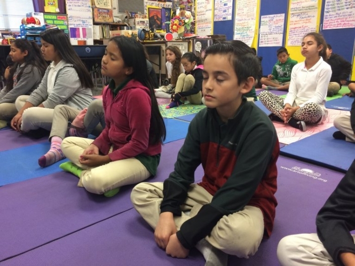 Fifth-graders at Horace Cureton Elementary in San Jose, California, practice meditation. From mercurynews.com