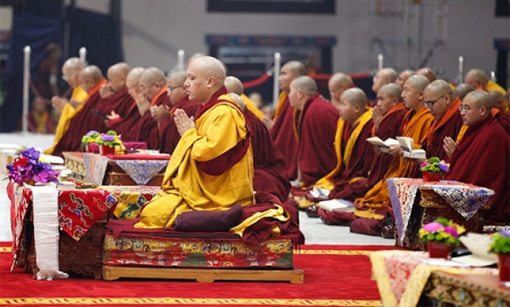 The Karmapa praying during the opening session of the 34th Kagyu Monlam Chenmo in Bodh Gaya on 13 February 2017. From kagyuoffice.org