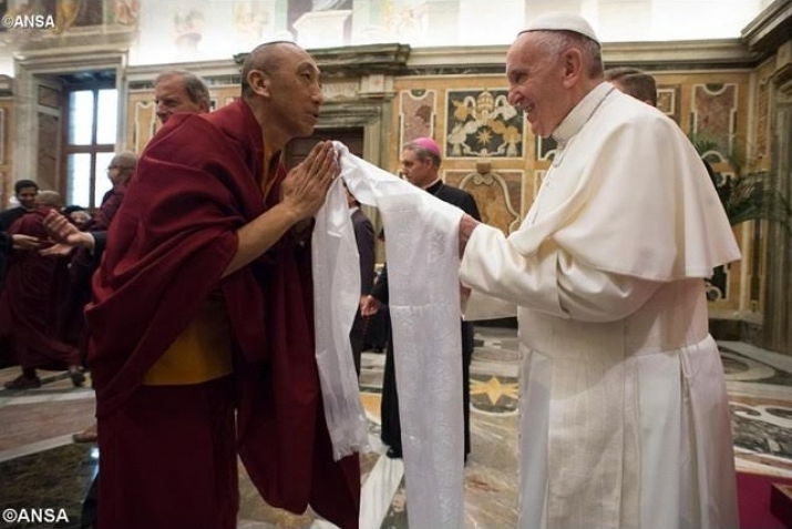 Pope Francis with a Buddhist monk during an inter-faith audience. From radiovaticana.va
