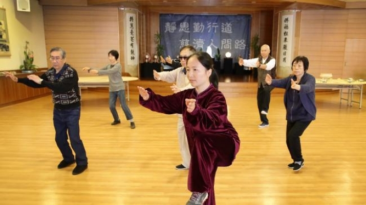 Emily Yang guides participants in the tai chi study. From dailytelegraph.com.au
