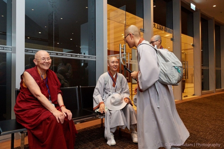 Meeting old and new friends at the conference. Image courtesy of Sakyadhita International Association of Buddhist Women, Photographer Olivier Adam
