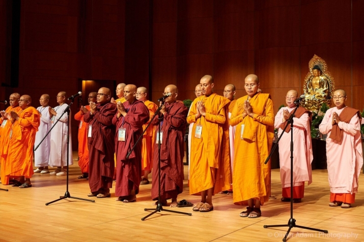Nuns from all traditions gather on stage during the opening ceremony of the 15th Sakyadhita conference. Image courtesy of Sakyadhita International Association of Buddhist Women. Photographer Olivier Adam