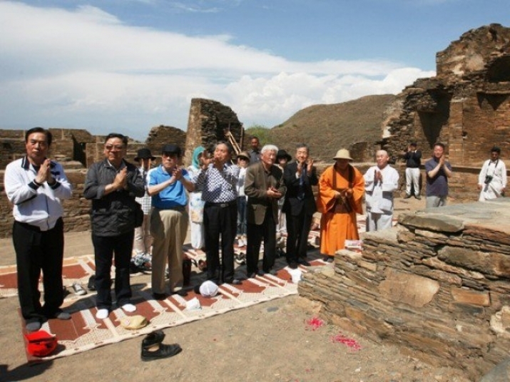 South Korean monks is offering prayers at Takht Bhai monastery complex in Pakistan. From tribune.com.pk