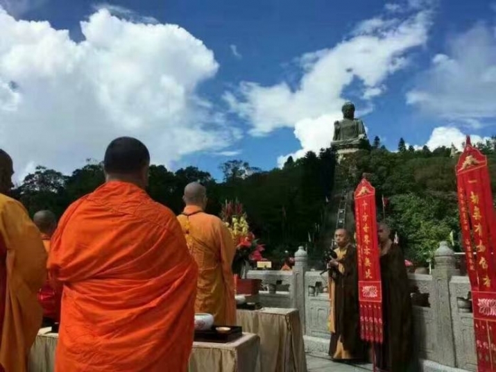 Monks at Po Lin Monastery mark the anniversary of the Hong Kong handover on 29 June. Image courtesy of Hugo San