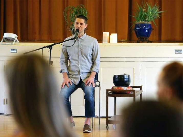 Thomas McConkie leads a meditation session in Salt Lake City, Utah. From religionnews.com