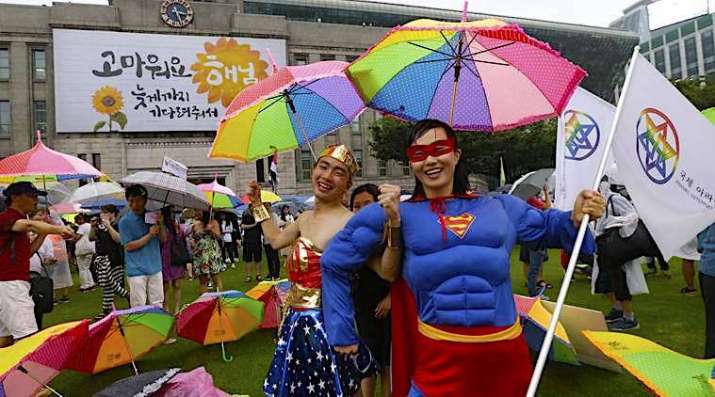 Participants pose during the LGBT pride festival in Seoul on Saturday. Photo by Ahn Young-joon. From indianexpress.com