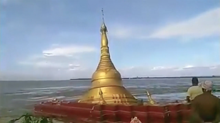Thiri Yadana Pyilone Chantha pagoda was swallowed by floodwater last week. From youtube.com