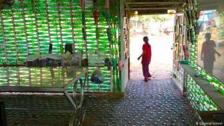 The library lined with green beer bottles. From newsworldindia.in