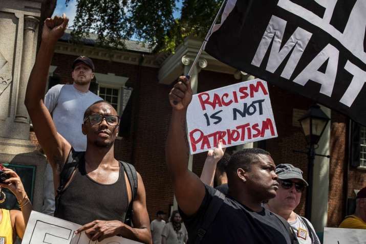 Counterprotesters in Charlottesville. Photo by Edu Bayer. From nytimes.com