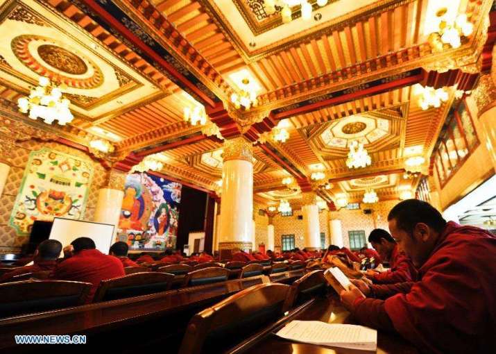 Monks study in the Tibet Buddhist Theological Institute. Photo by Purbu Zhaxi. From en.people.cn