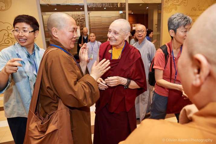 Jetsunma Tenzin Palmo with attendees. From Olivier Adam