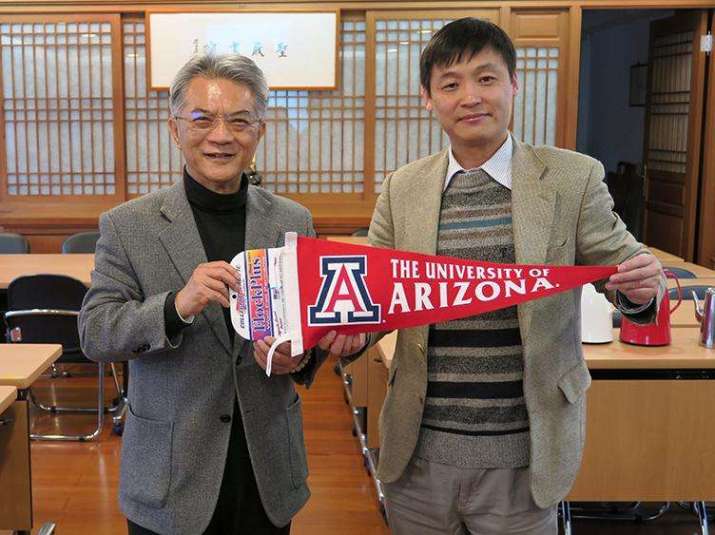 University of Arizona Center for Buddhist Studies director Jiang Wu left, and Cai Qingyan in Taiwan. From arizona.edu