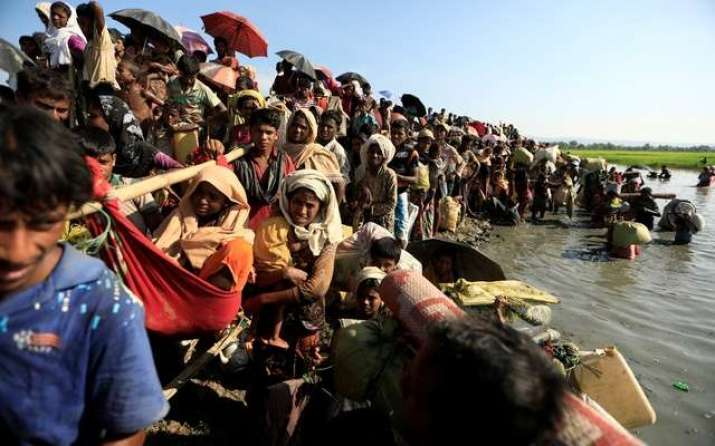 Rohingya refugees waiting at the Myanmar-Bangladesh border. From reuters.com