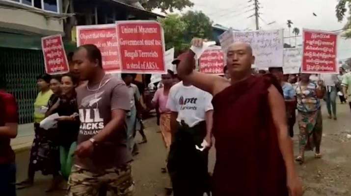 Hardline Buddhists, both lay and monastic, protest against the Rohingya in Sittwe, Myanmar. From news.sky.com