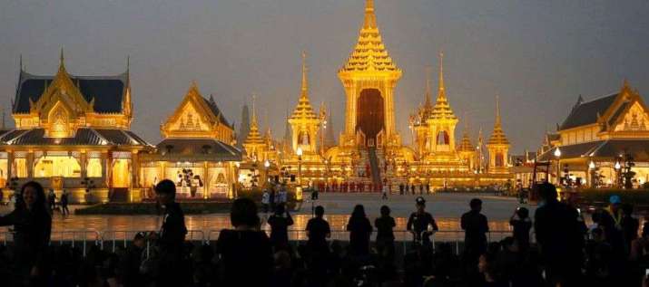 People gather outside the royal crematorium in Bangkok’s Sanam Luang. From abcnews.go.com