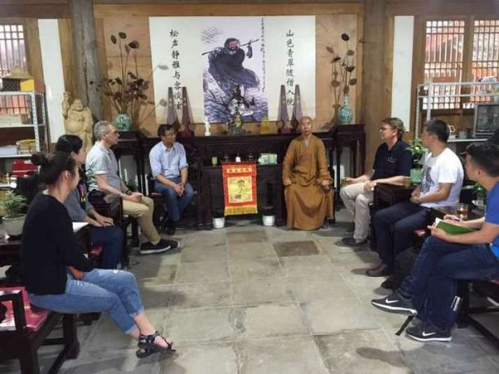 Tea and conversation at Yanfu (Extending Blessings) Monastery in Wuyi with the abbot, Prof. Qiu of Jiliang University, Prof. Paul Crowe of Simon Fraser University, and UA’s Prof. Albert Welter and students. From uanews.arizona.edu