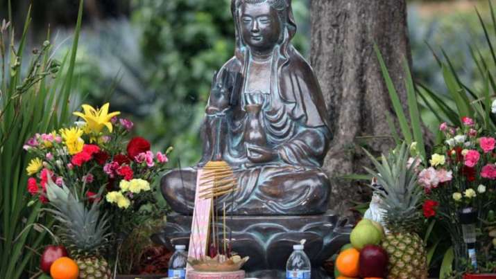 This image of Guanyin is one of the many additions to the shrine. Photo by Thomas Walden Levy. From pri.org