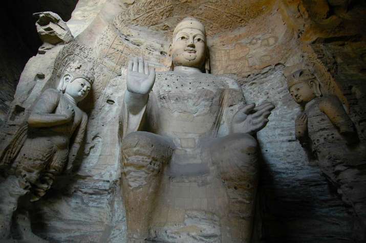 The original Buddhist statues at the Yungang Grottoes. Photo by Rita Willaert. From gbtimes.com