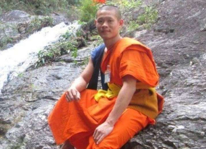 Assistant football coach Ekaphol Chanthawong, known as Brother Ekk, spent 10 years as a Buddhist monk. From reddit.com