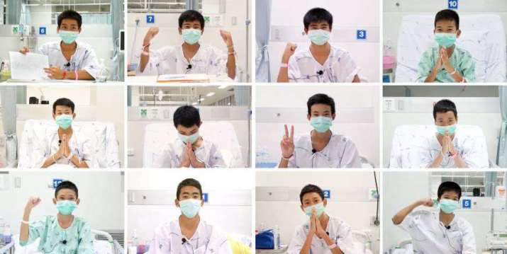 The 12 boys, members of the Wild Boars youth football team, in a series of screenshots taken at the hospital in Chiang Rai on Friday. From japantimes.co.jp
