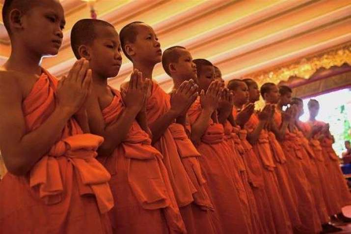 The 11 boys during the disrobing ceremony. The Thai cave boys ordained in honor of retired Thai Navy SEAL Saman Gunan, who lost his life during the daring the rescue operation. From thestar.com.my