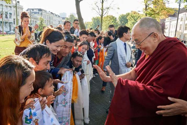 His Holiness the Dalai Lama meets well-wishers on arriving at his hotel in Rotterdam, the Netherlands, on 14 September. Photo by Olivier Adam. From dalailama.com