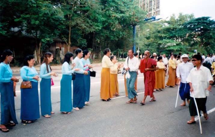 Sayadaw U Nye Ya takes part in the International White Cane Day march in Mandalay