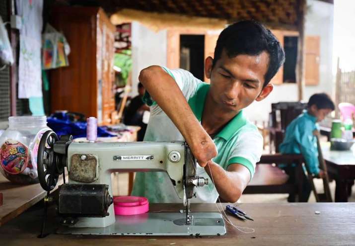 Thoo teaches sewing at the Monywa School for the Blind and Disabled