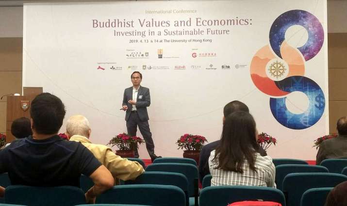 Dr. Ernest Chi-Hin Ng speaking before the audience at The University of Hong Kong Sunday. Image courtesy of the author