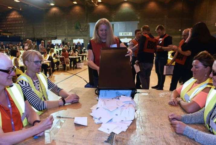 British election workers. From mercurynews.com