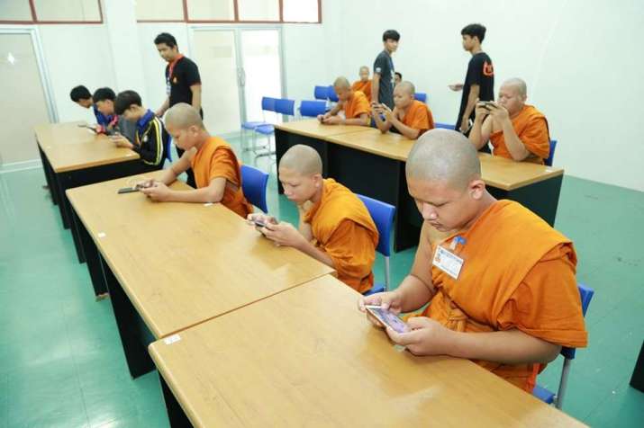 Thai novice monks during the video game competition. From kotaku.com