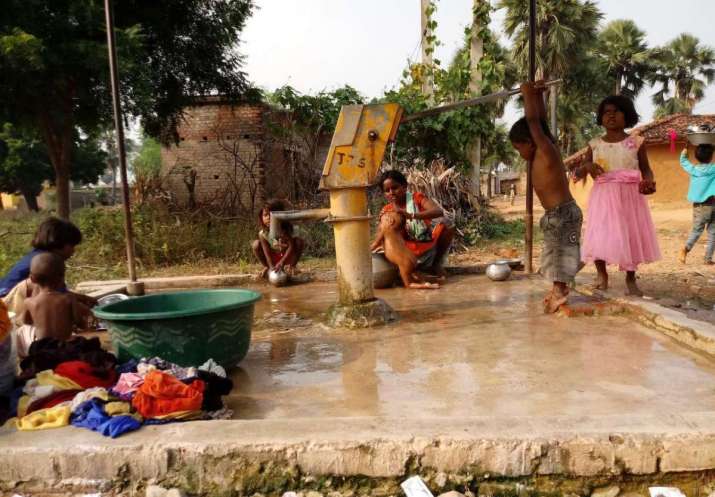 Wells and hand pumps help to provide much-needed water to these marginalized communities. Image courtesy of JTS India