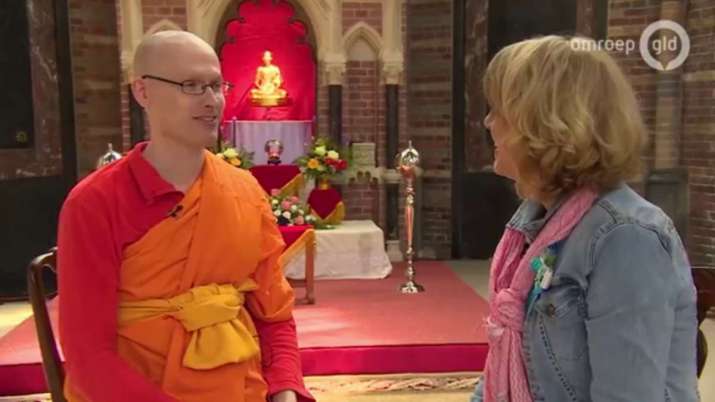 Sander Oudenampsen inside the new Wat Phra Dhammakaya Nederland in 2017. From youtube.com