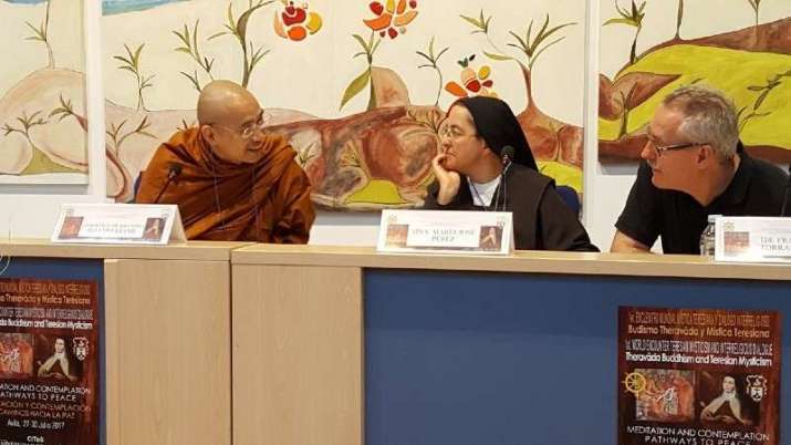 From left to right: Ven. Dr Khammai Dhammasami, Sister María José Pérez, and Dr Francesc Torradeflot Freixes, director of the UNESCO Association for Interreligious Dialogue, during the First Encounter of Theravada Buddhism and Teresian Mysticism in July 2017. Image courtesy of the author