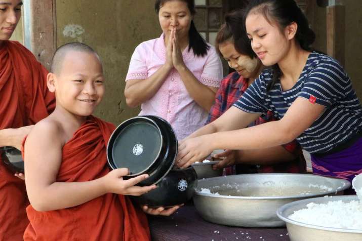 Providing meals at PDO, a Buddhist monastic school in Myanmar. Image courtesy of JTS Korea