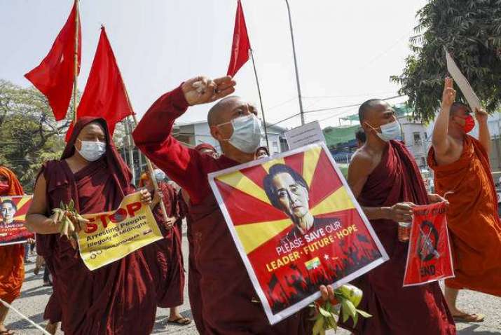 Buddhist monks and nuns protest in Mandalay on Tuesday. From triblive.com