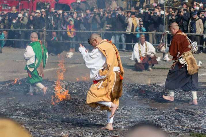 Monks walk on smoldering embers. From japanistry.com