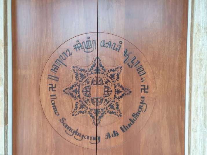 <i>Namo Sanghyang Adi Buddhaya</i> in Latin and Old Javanese scripts on the door of a temple. Image courtesy of Dr. Metta Agustina