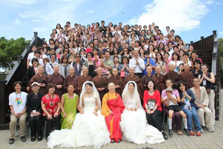 Ven. Shih Chao-hwei, center, conducted the first LGBTQ Buddhist wedding ceremony in Taiwan at the Buddhist Hong-shi College in August 2012. From facebook.com