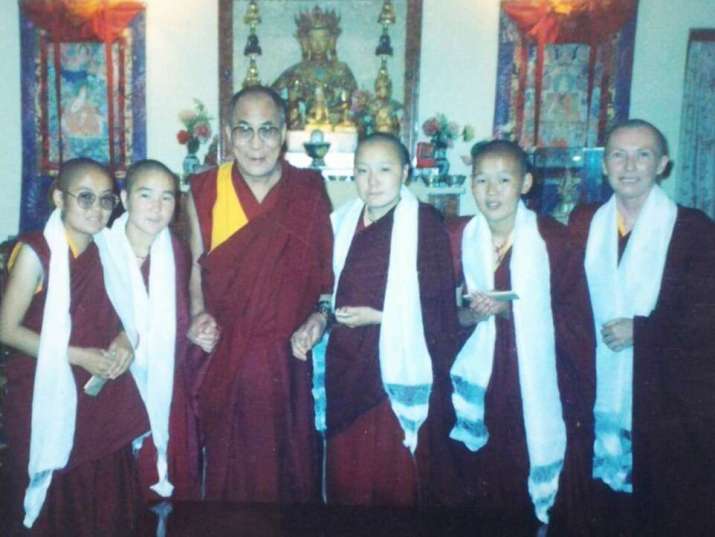 Audience with His Holiness the Dalai Lama in 1994 for the first four nuns to graduate from Jamyang Choling nunnery in Dharamsala, founded by Ven. Karma Lekshe Tsomo (far right). Kunze Chimed stands to the right of His Holiness. Image courtesy of the author