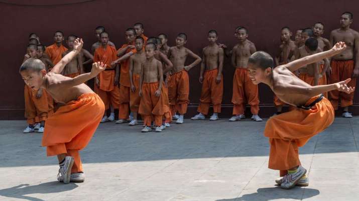 Boy monks practice martial arts, Shaolin Temple, 2017. Image courtesy of Maxpixel