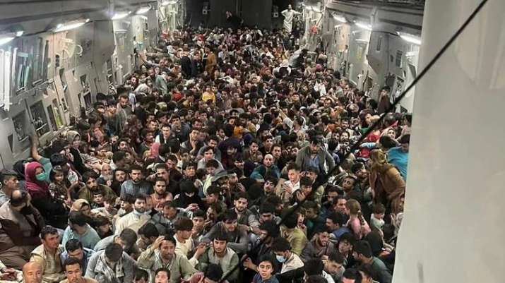 Afghans on a US military transport plane. From sbs.com.au