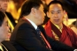 The 11th Panchen Lama, Bainqen Erdini Qoigyijabu (R), talks with an attendee during a sub-forum of the Second World Buddhist Forum (WBF) in Wuxi, east China's Jiangsu Province, on March 29, 2009. (Xinhua/Han Yuqing)