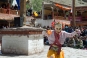 On the courtyard in front of the Hemis monastery dancers with colorful masks perform the mystic mask dances (Chams) and sacred plays around the central flagpole.